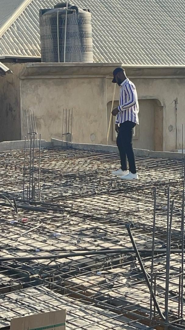 Project Manager on site inspecting slab